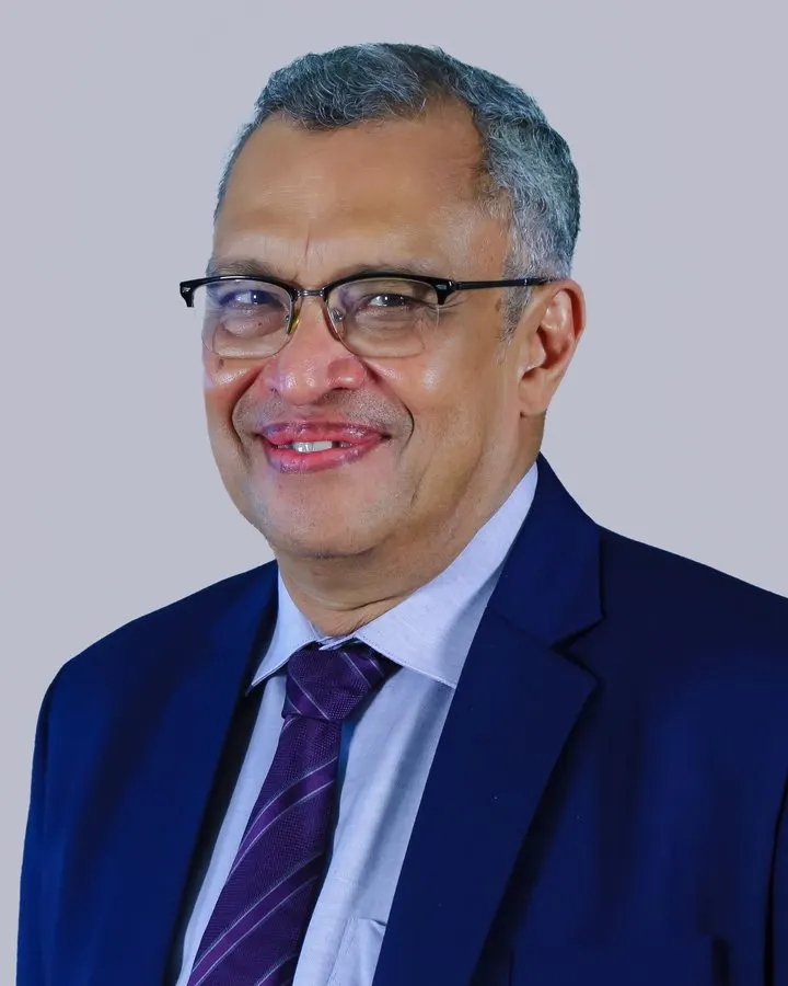 Portrait of Dr Mathew Abraham