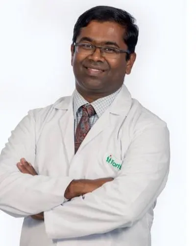 Portrait of Dr. Mohan Karisankappa Puttaswamy